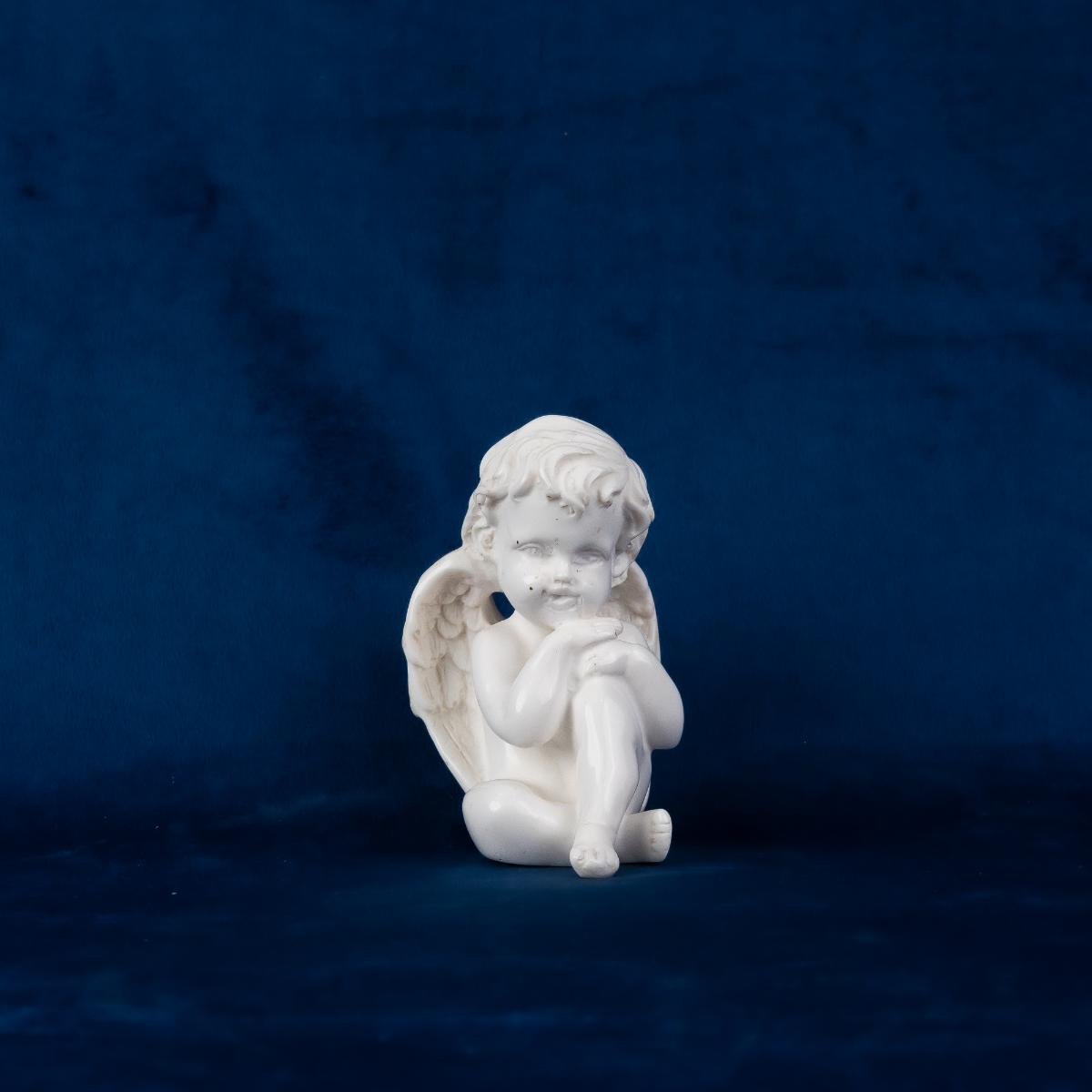 Roman Figurine Sitting Boy